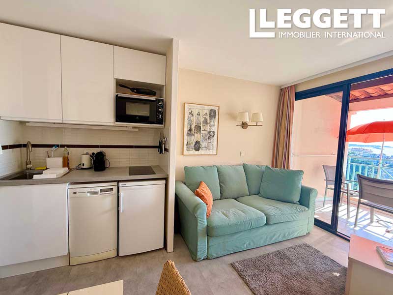 In a residence with panoramic sea views: Luxury apartment with a garden ...